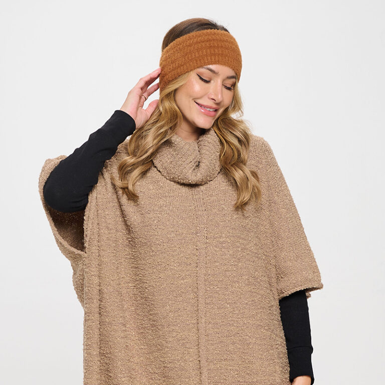 Accent model with brown sweater and earwarmer