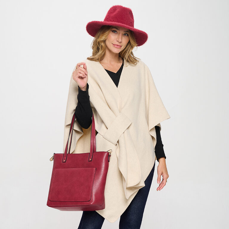 Accent model with poncho and red hat and bag