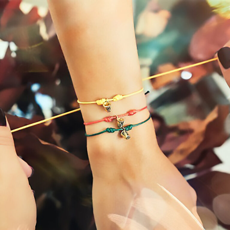 Keep Out Bracelets tying yellow